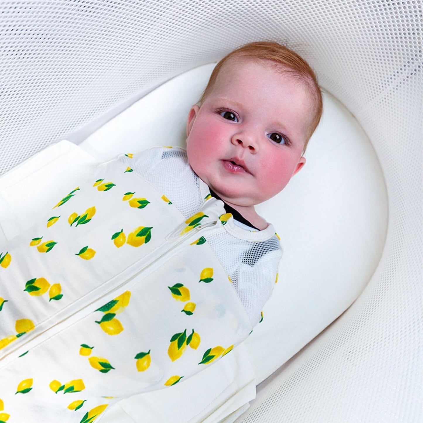 Happiest Baby SNOO Sleep Sack - 100% Organic Cotton Baby Swaddle Blanket - Doctor Designed Promotes Healthy Hip Development (Ivory Lemons, X-Large)